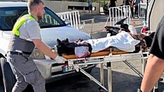 A Civil Defence first-responder carries a wounded man whose handheld pager exploded at al-Zahraa hospital in Beirut, on Sept. 17, 2024