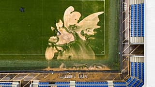  aerial view of a sinkhole on the pitch and flooded walkways at the Cherry Red Records Stadium, home of AFC Wimbledon in London, Monday, Sept. 23, 2024,