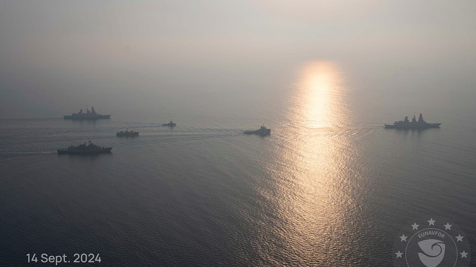 This photo released by the European Union’s Operation Aspides shows warships attached to the mission escorting salvage ships in the Red Sea on Saturday, Sept. 14, 20