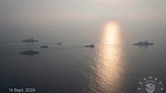 This photo released by the European Union’s Operation Aspides shows warships attached to the mission escorting salvage ships in the Red Sea on Saturday, Sept. 14, 20