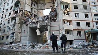 The aftermath of a Russian attack that hit a residential building in Kharkiv, Ukraine.