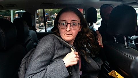 Caroline Ellison, former CEO of Alameda Research founded by Sam Bankman-Fried, after she exits the Manhattan federal court after testifying in October 2023.