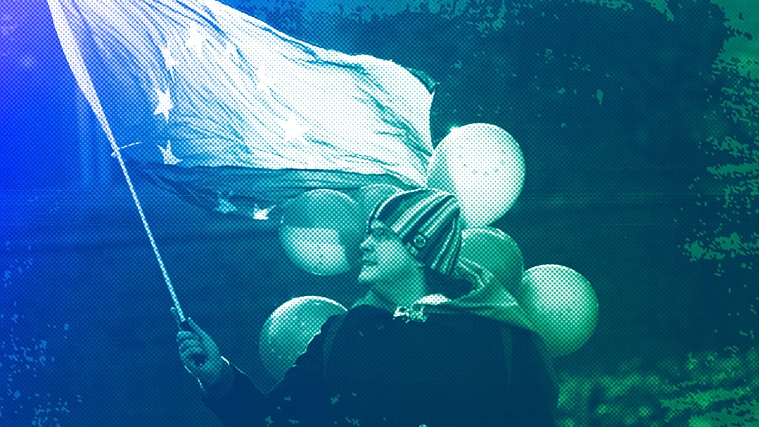 FILE: A man waves the European flag in front of the Houses of Parliament in London, May 2019