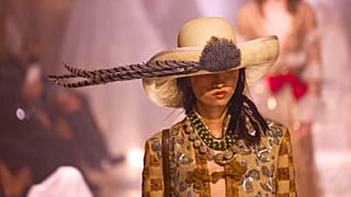 A model wears a creation as part of Valentino's Spring/Summer 2025 collection 