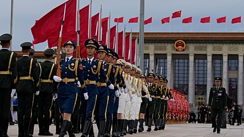 Members of a honour guard rehearse before a ceremony to mark Martyrs' Day ahead of the 75th anniversary, Beijing, Monday, Sept. 30, 2024.