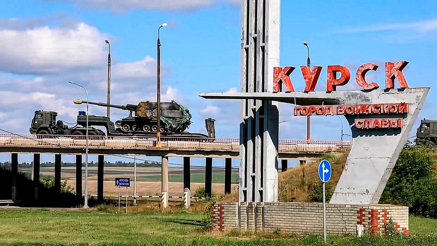 Russian military vehicles move to fight Ukrainian forces in Kursk 