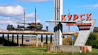 Russian military vehicles move to fight Ukrainian forces in Kursk 