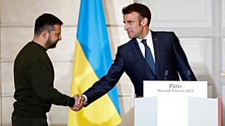 FILE - French President Emmanuel Macron shakes hands with Ukrainian President Volodymyr Zelenskyy, during a press conference in 2023