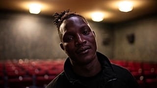 Abou Sangare, lead actor in the film “L'histoire de Souleymane”, poses for photos after the premiere at the Louxor cinema in Paris, October 8, 2024