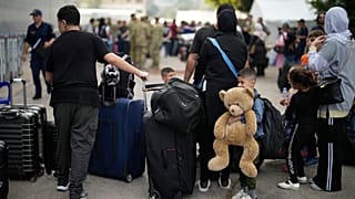 People, mainly Turkish citizens, are waiting in the port of Beirut to be evacuated to Turkey.