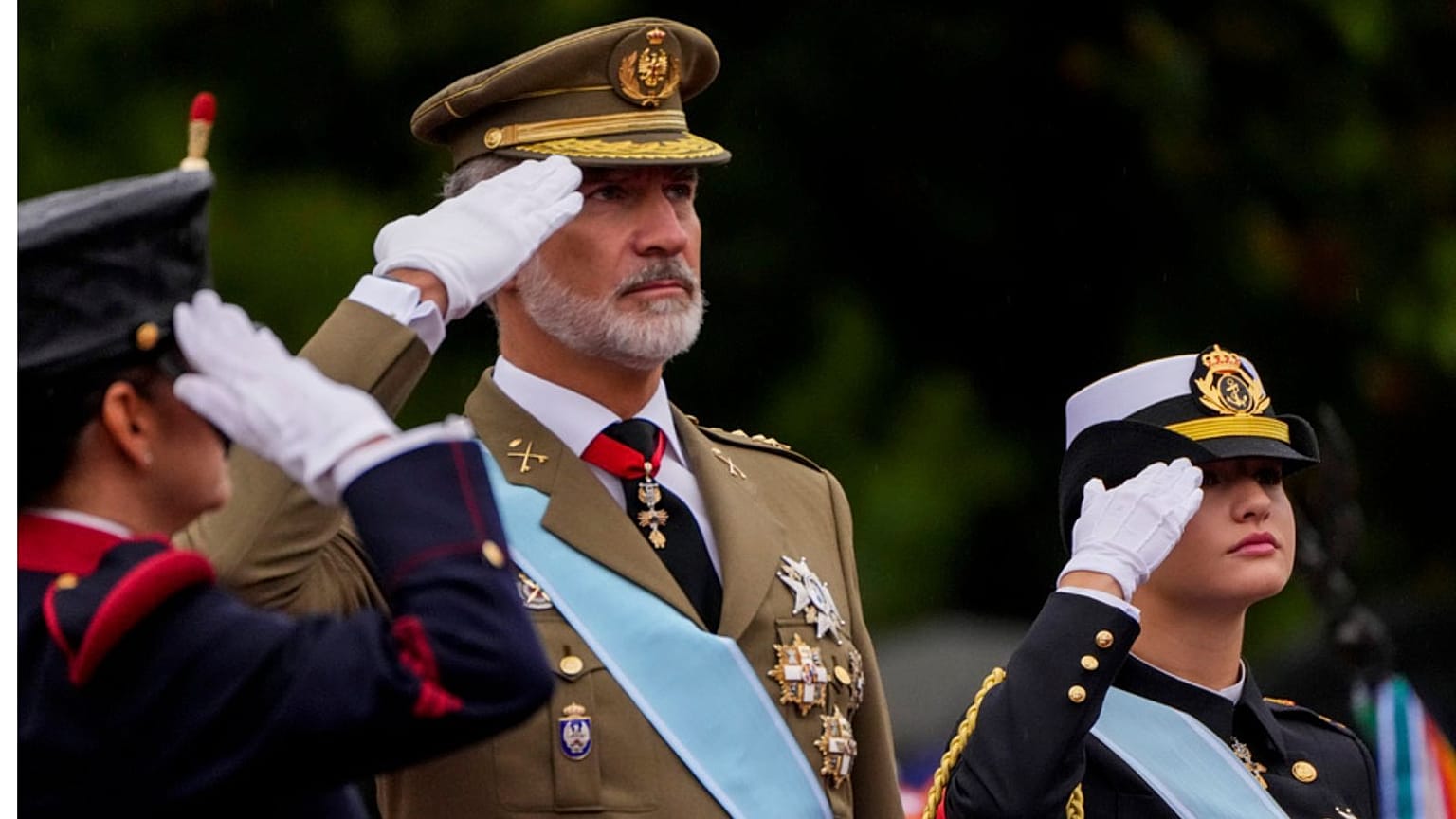 Spain's King Felipe VI, left, and Princess Leonor, right, attend the military parade on the national holiday known as "Dia de la Hispanidad" or Hispanic Day in Madrid