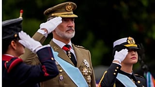 Spain's King Felipe VI, left, and Princess Leonor, right, attend the military parade on the national holiday known as "Dia de la Hispanidad" or Hispanic Day in Madrid