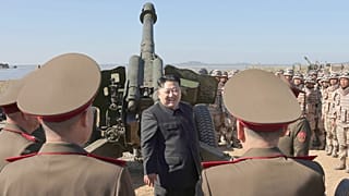 FILE: North Korean leader Kim Jong Un, center, visits to watch an artillery exercise at an undisclosed place in North Korea, undated