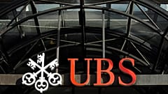 File photo. The UBS bank logo is seen above the main entrance of its offices in the City of London. 3 October 2008.