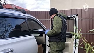Orosz nyomozók a tett helyszínén