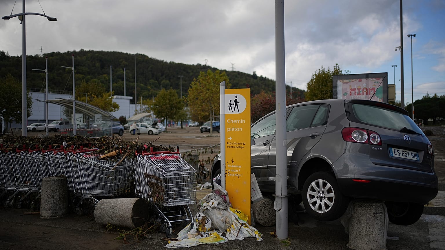Car stranded in the car park of the Givors shopping centre, following torrential rain that submerged roads and railways on Friday 18 October 2024.
