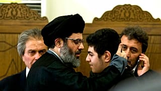 FILE - In this May 13, 2016 file photo, Hashem Safieddine, head of Hezbollah's executive council, second left, is seen in a southern suburb of Beirut, Lebanon. 