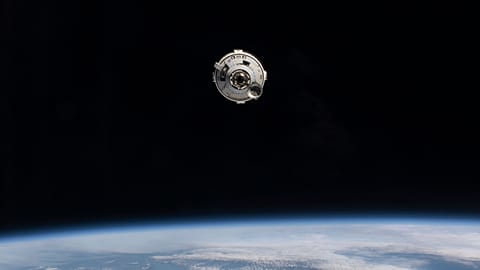 NASA photo of Boeing Starliner spacecraft approaching the International Space Station.