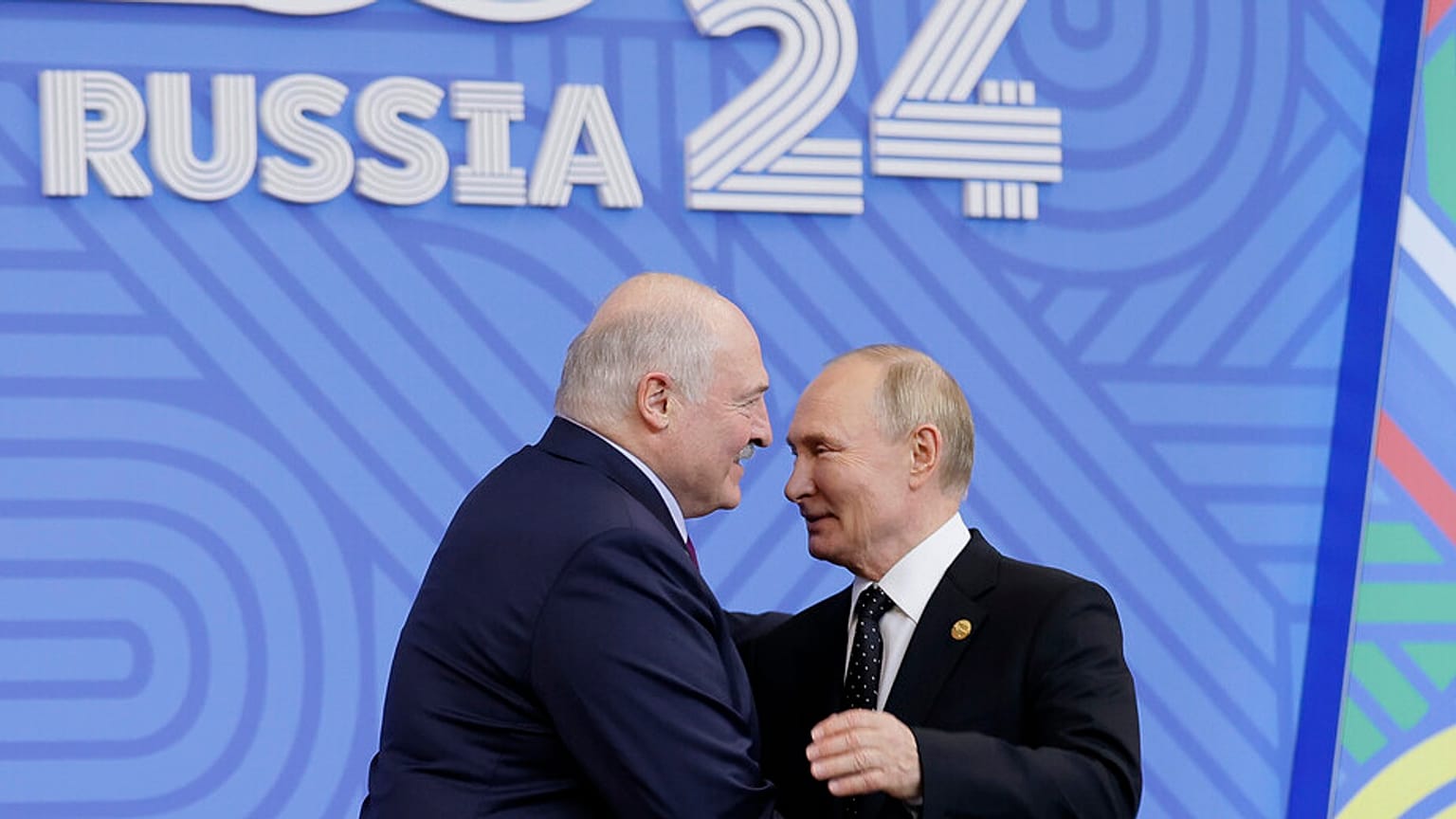 Lukashenko and Vladimir Putin at the BRICs conference on Wednesday