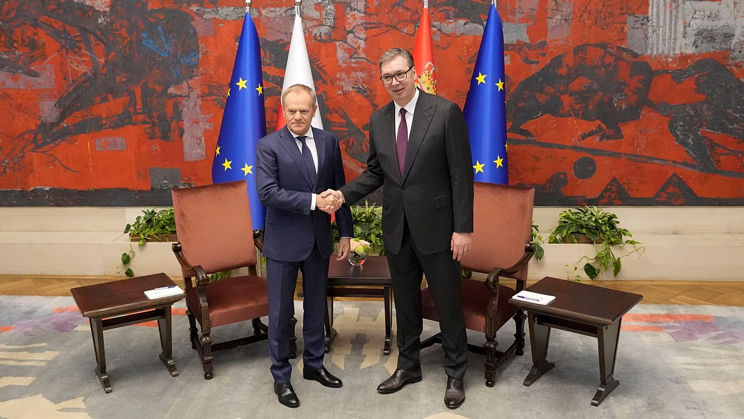 Poland's Prime Minister Donald Tusk, left, shakes hands with Serbian President Aleksandar Vucic in the Serbia Palace in Belgrade, Serbia, Thursday, Oct. 24, 2024.