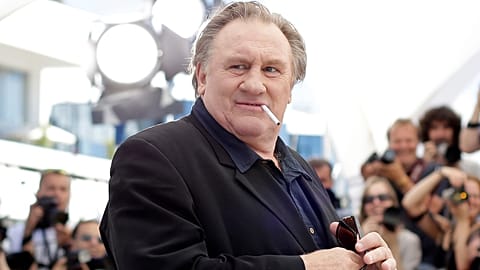 French actor Gerard Depardieu poses for photographers during a photo call for the film 'Valley of Love', at the 68th Cannes film festival, 2015.