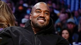 Kanye West, known as Ye, watches the first half of an NBA basketball game between the Washington Wizards and the Los Angeles Lakers, on 11 March 2022