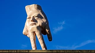 New Zealand waves goodbye to divisive giant hand sculpture  