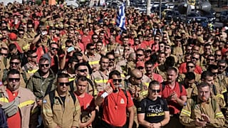 Hundreds of seasonal firefighters attend a protest outside Greece's Civil Protection Ministry in Athens