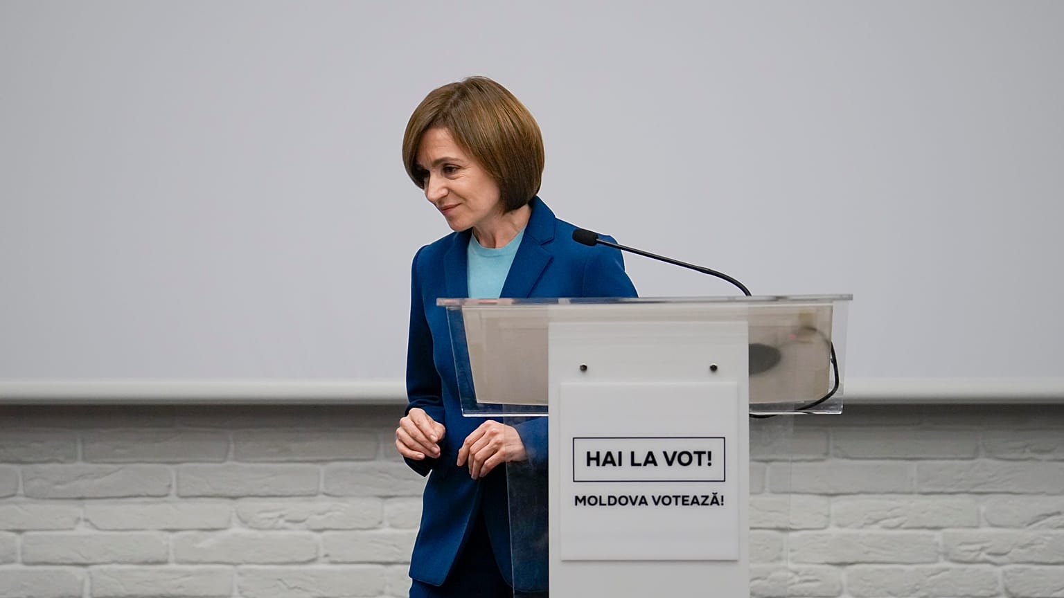 Moldova's President Maia Sandu leaves after speaking to the media during a press briefing after the polls closed for the presidential election runoff, 3 November, 2024