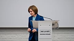 Moldova's President Maia Sandu leaves after speaking to the media during a press briefing after the polls closed for the presidential election runoff, 3 November, 2024
