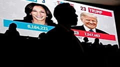 Students watch live election results during a watch party near an election night event in Washington, 5 November 2024