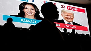 Students watch live election results during a watch party near an election night event in Washington, 5 November 2024