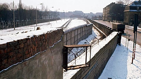 This undated photo shows a section of the Berlin Wall at Bernauer Strasse with parts of the Lazarus Sisters' mother house in West Berlin at right.
