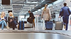 Passengers inside airport terminal