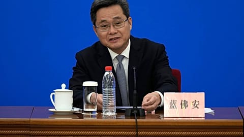 Finance Minister Lan Fo'an speaks at a press conference on a plan to boost the economy, at the Great Hall of the People in Beijing