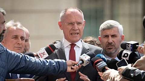 Austria's Interior Minister Gerhard Kraner, speaks to media during statements with Romanian counterpart Lucian Bode in Bucharest.