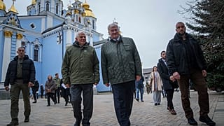 European Union foreign policy chief Josep Borrell and Ukrainian Minister of Foreign Affairs Andrii Sybiha walk in front of St. Michael's Golden-Domed Monastery in Kyiv.