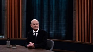 Germany's Chancellor Olaf Scholz sits in the television studio of the ARD program 'Caren Miosga' before the start of the live interview in Berlin, 10 November, 2024