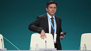 Yalchin Rafiyev, Azerbaijan's COP29 lead negotiator, arrives for a news conference at the COP29 UN Climate Summit, 12 November, 2024, in Baku, Azerbaijan.