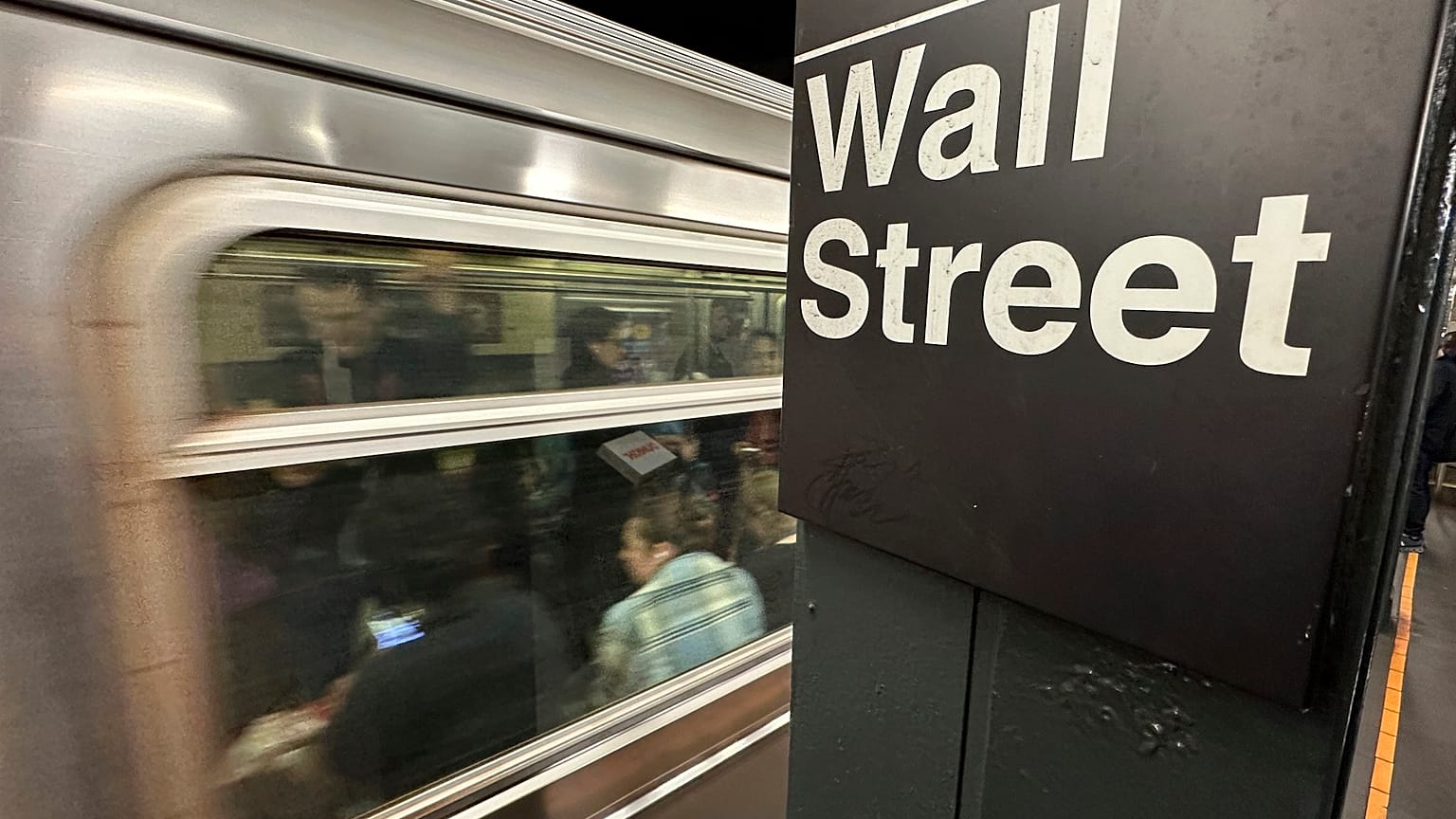 A train arrives at a Wall Street underground station in New York's Financial District