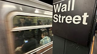 A train arrives at a Wall Street underground station in New York's Financial District