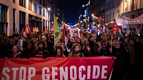 Protesters take part in a rally against the "Israel is Forever" gala organized by far-right Franco-Israeli figures, in Paris, Wednesday, Nov. 13, 2024