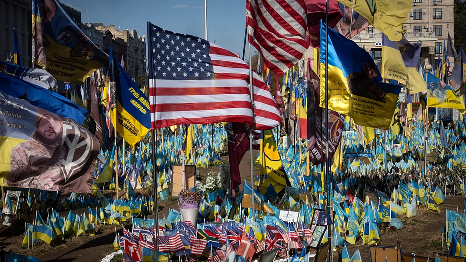 US and Ukrainian national flags wave to commemorate American volunteers, in Kyiv, Ukraine, Friday, Sept. 27 2024.