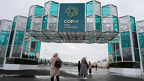 People enter the venue ahead of the COP29 U.N. Climate Summit, Saturday, Nov. 9, 2024, in Baku, Azerbaijan.