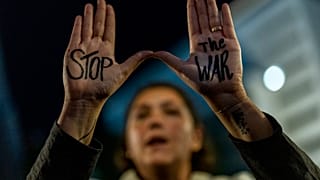 An anti-war protestor in Brussels