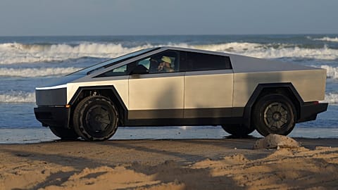 A Tesla Cybertruck moves along the beach in Boca Chica, Texas