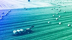 A farmer harvests his field at the Harz mountains near Wernigerode, July 2022