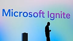 Microsoft CEO Satya Nadella stands in silhouette during the Microsoft Ignite conference Tuesday, Nov. 19, 2024, in Chicago. 