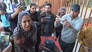 أم فلسطينية تودّع أطفالها الثلاثة بعد غارة إسرائيلية على غزة