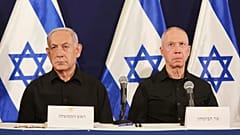 Israeli Prime Minister Benjamin Netanyahu, left and Defense Minister Yoav Gallant attend a press conference in the Kirya military base in Tel Aviv, Israel, Oct. 28, 2023.